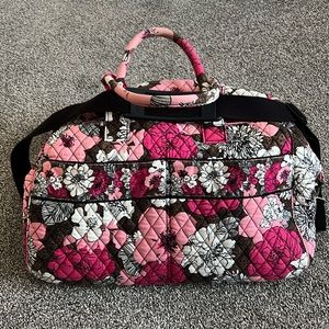 Vera Bradley Duffel Bag. Lots of pockets. Handles and shoulder strap.